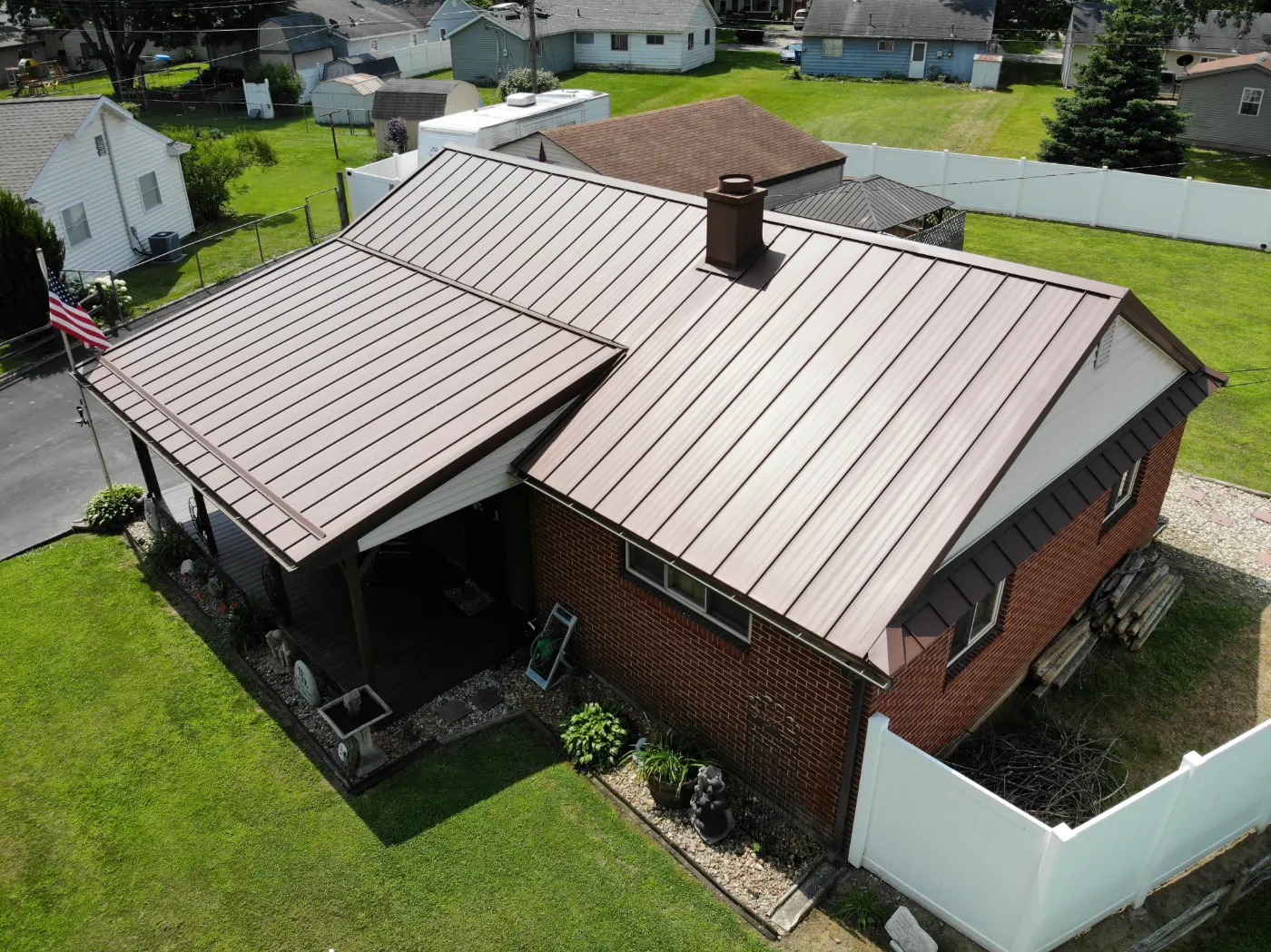 Tarping and dry-in on a Eagle Village commercial roof